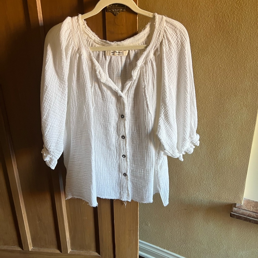 “We The Free” White Textured Blouse size medium (could fit large I believe)